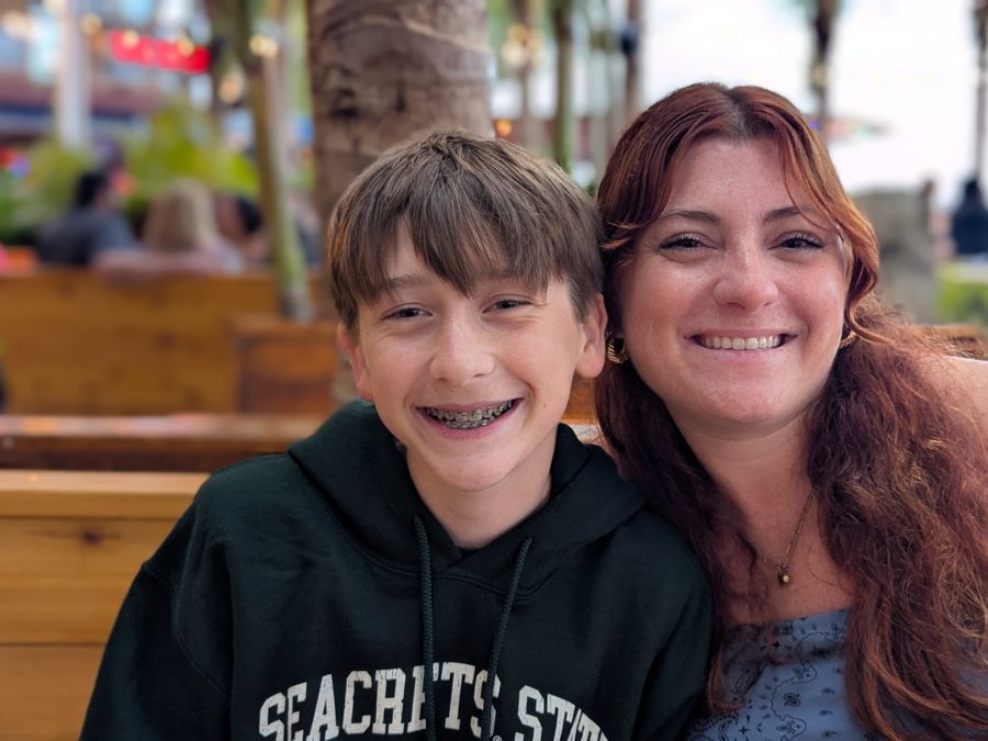 Two of Mark's family members smiling together